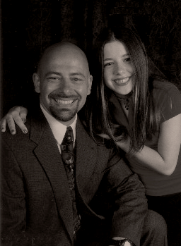 Black and white picture of Jennifer Ann Crecente at the age of 14 with her father.